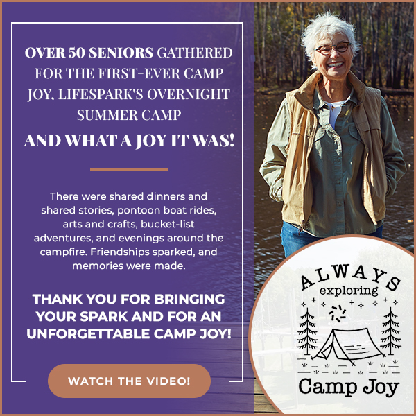 Promotional graphic for Camp Joy: Left panel with bold white text about seniors camp; right shows a smiling senior woman outdoors beside the 'Always Exploring Camp Joy' logo circle; CTA says 'Watch the Video!'